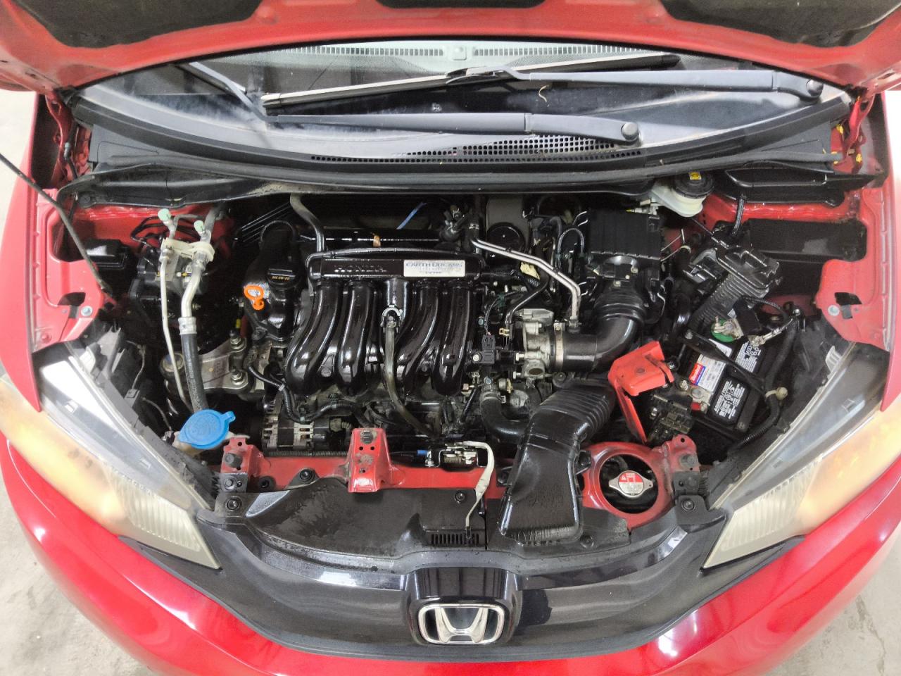 2016 Honda Fit Lx Red vin: JHMGK5H58GS011766 Damage: Serpentine Belt, Cracked, Replacement Required