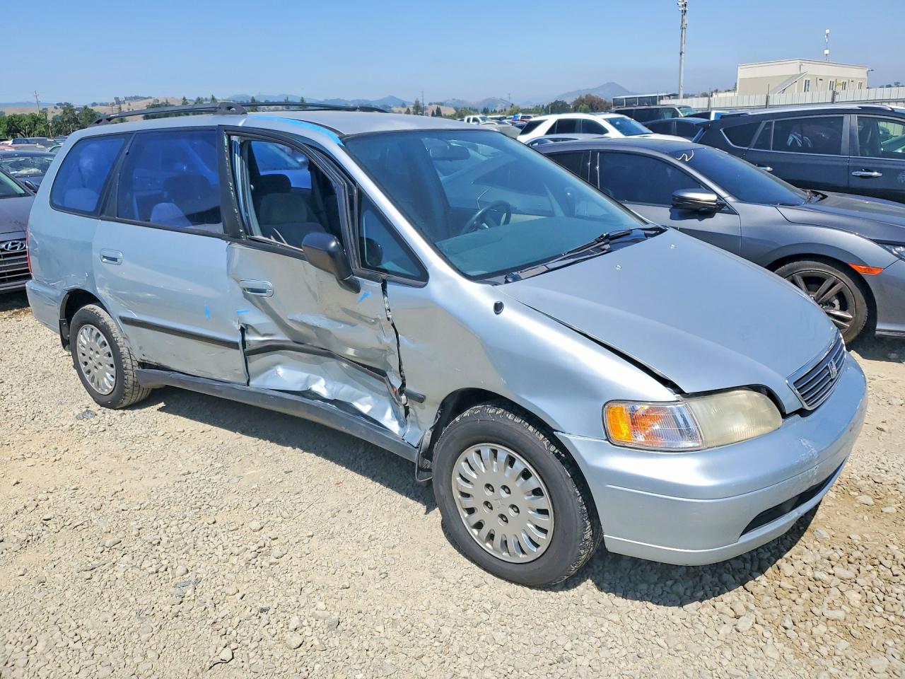 1997 Honda Odyssey Base Blue vin: JHMRA1861VC014562