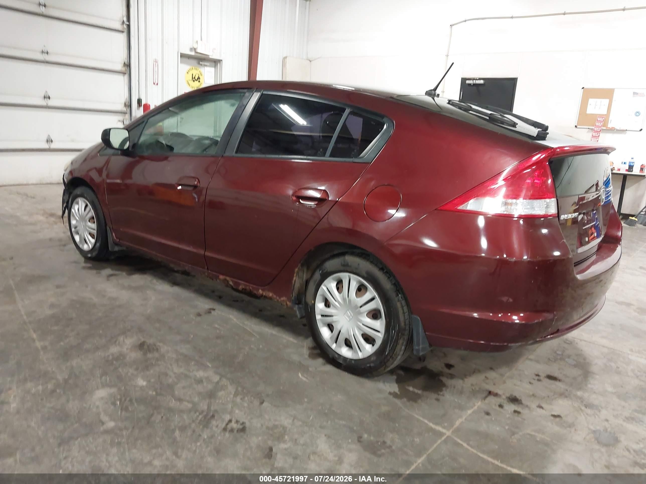 2011 Honda Insight   Red vin: JHMZE2H33BS005654