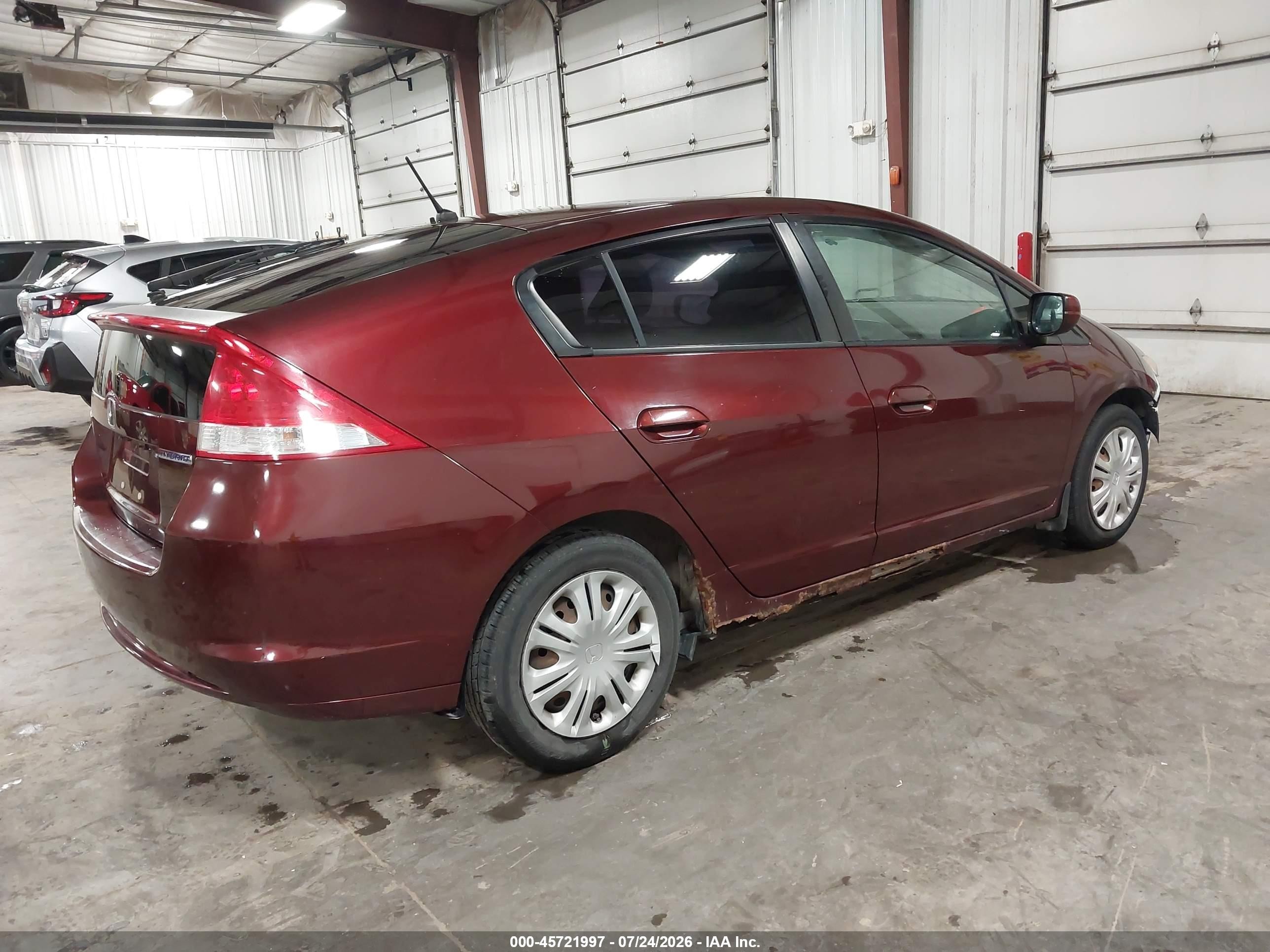 2011 Honda Insight   Red vin: JHMZE2H33BS005654