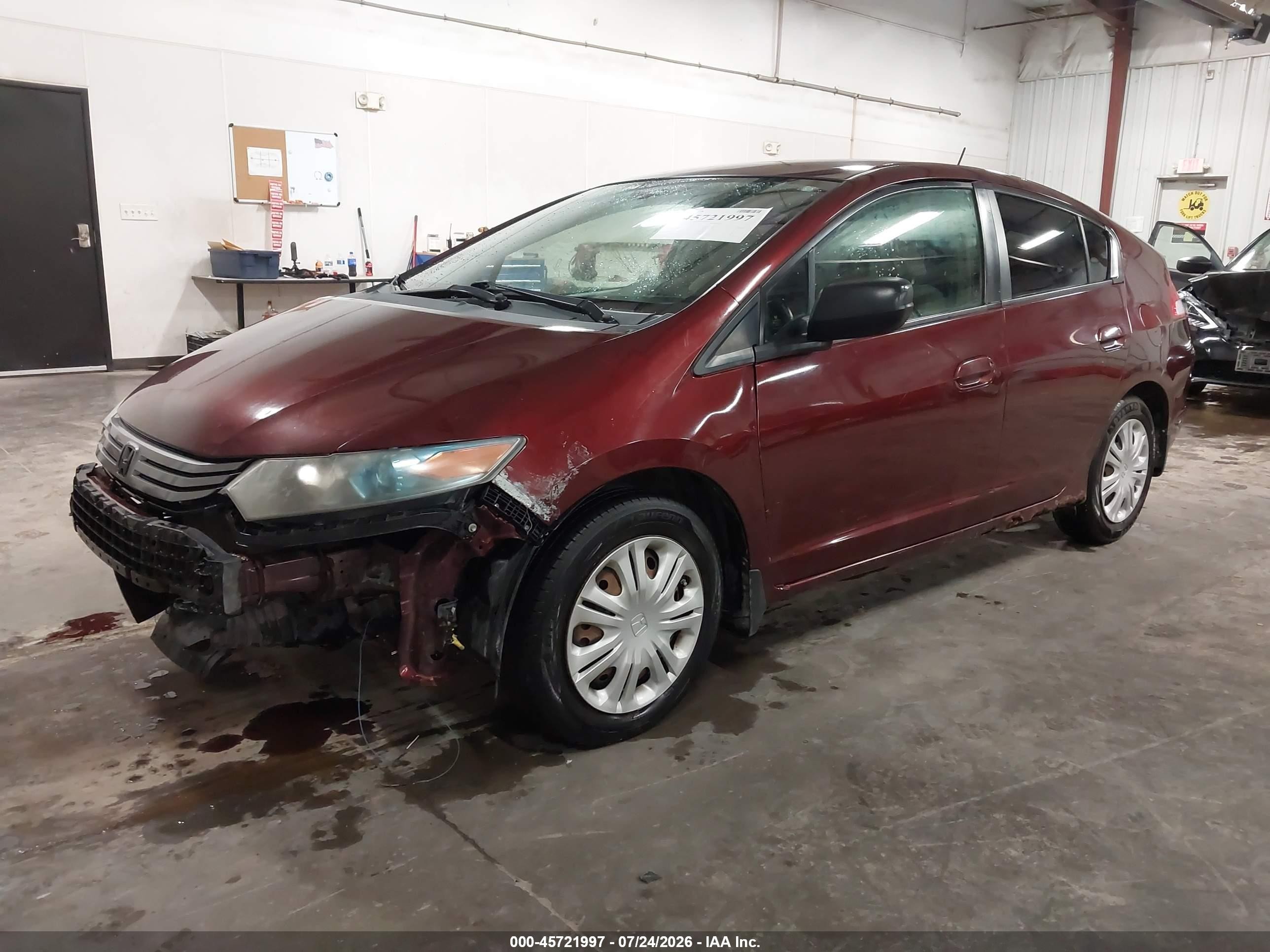 2011 Honda Insight   Red vin: JHMZE2H33BS005654