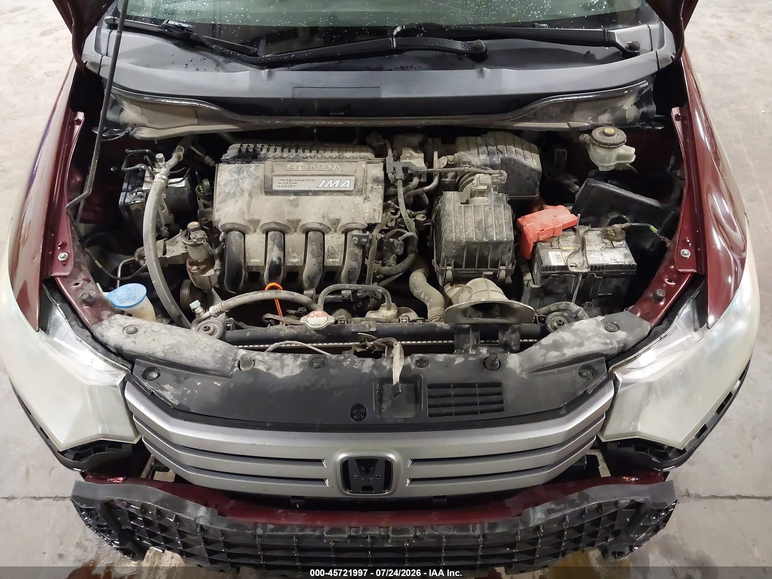 2011 Honda Insight   Red vin: JHMZE2H33BS005654