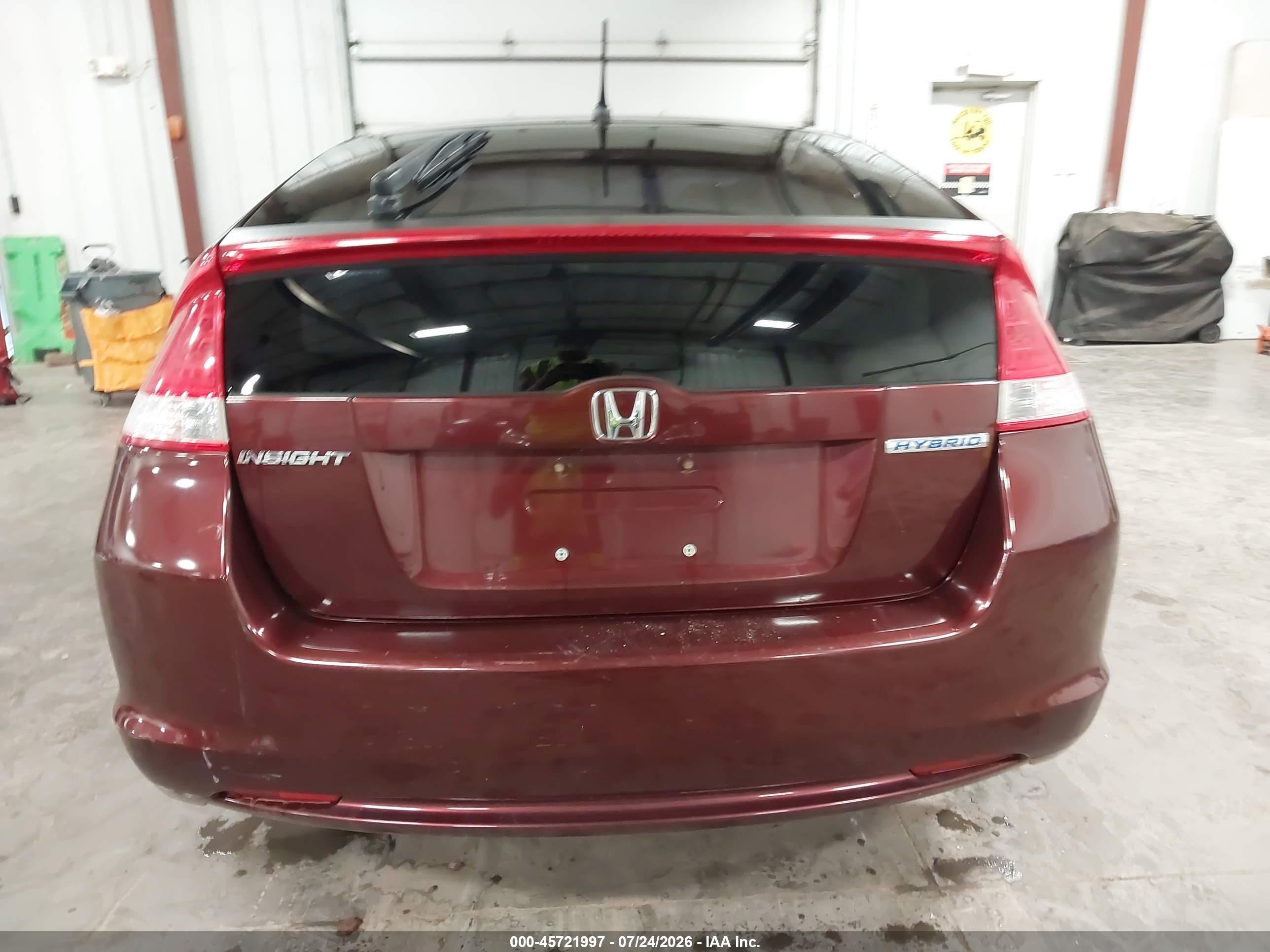 2011 Honda Insight   Red vin: JHMZE2H33BS005654