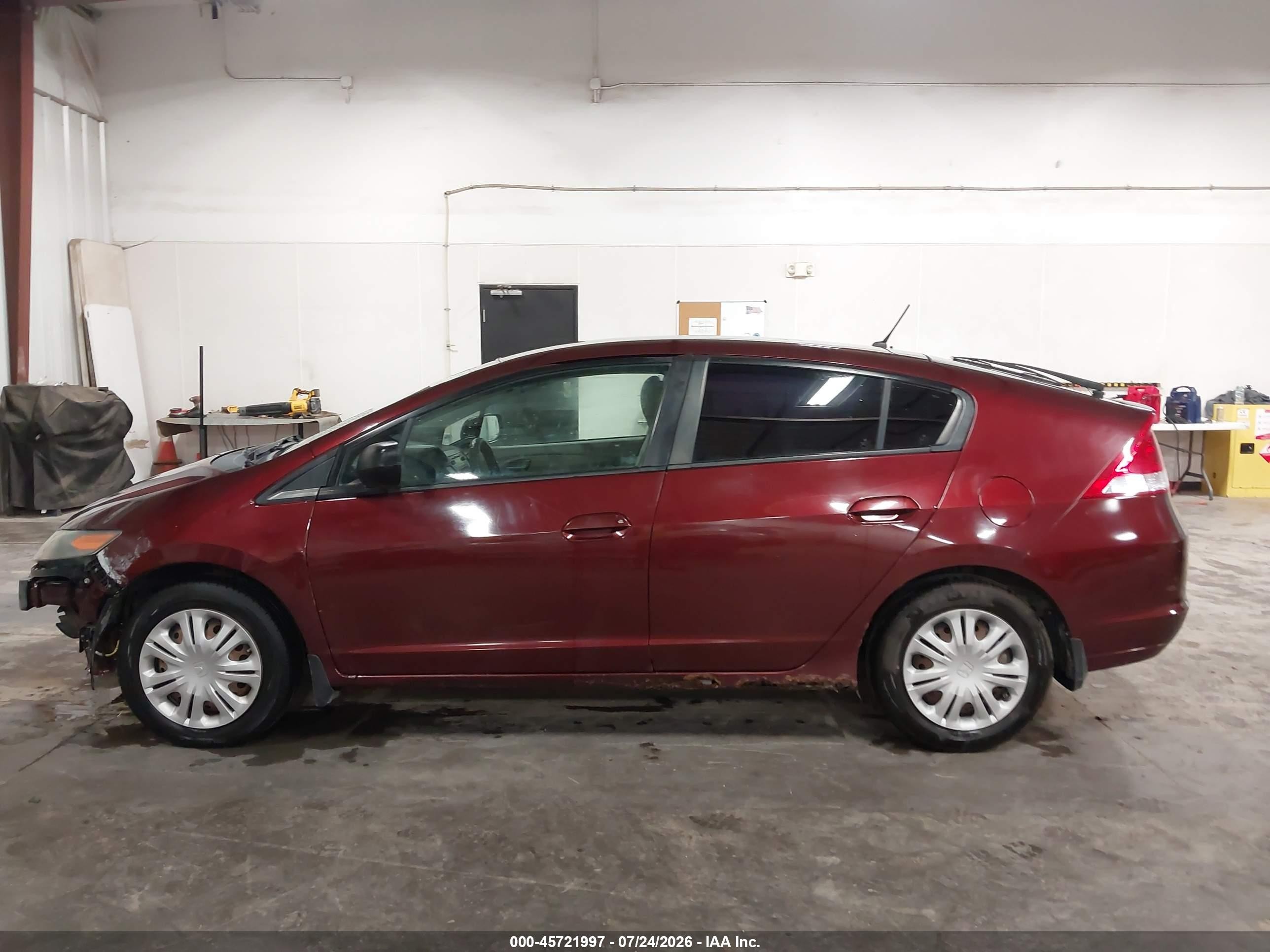2011 Honda Insight   Red vin: JHMZE2H33BS005654