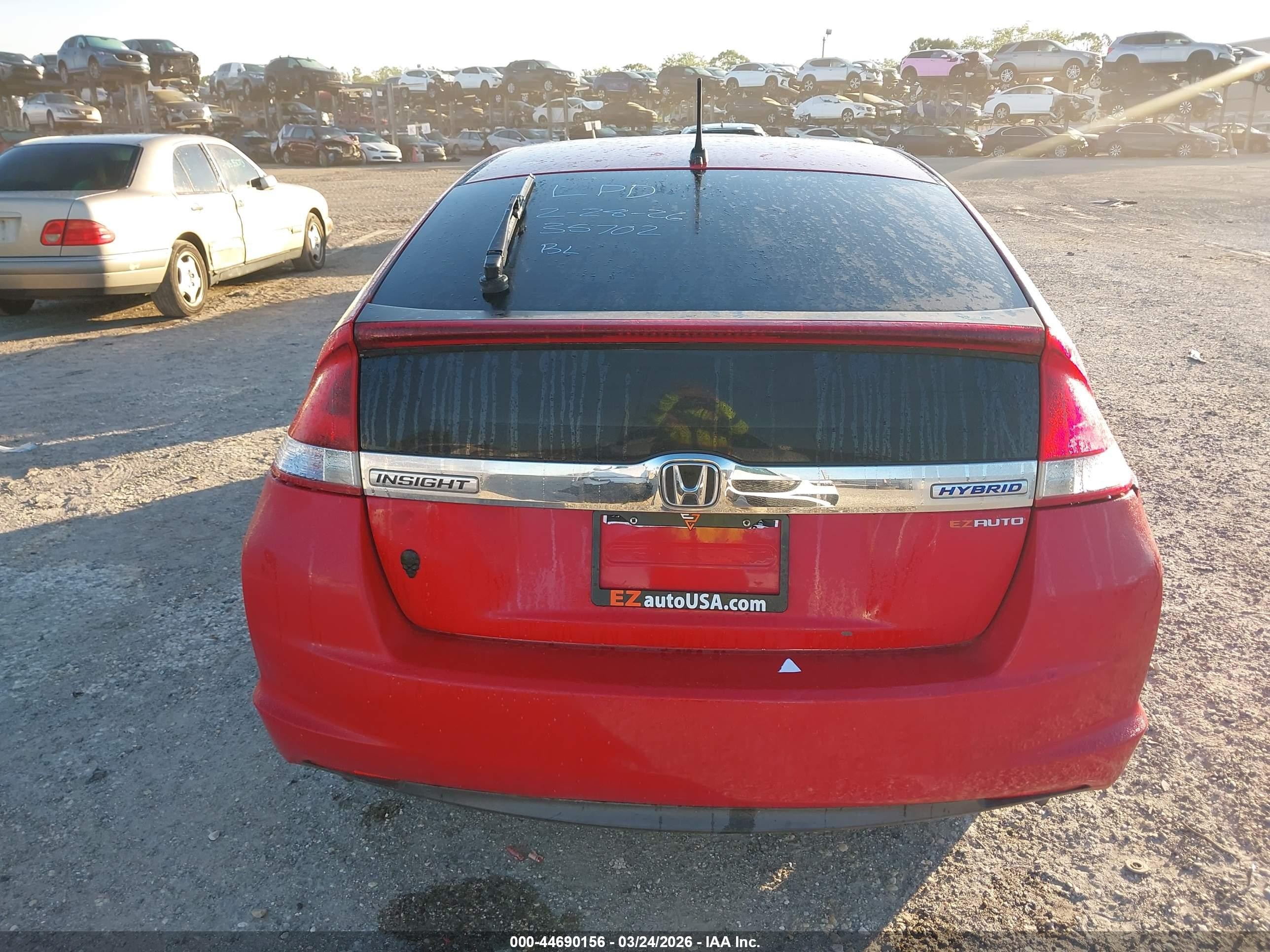 2012 Honda Insight   Red vin: JHMZE2H33CS000620