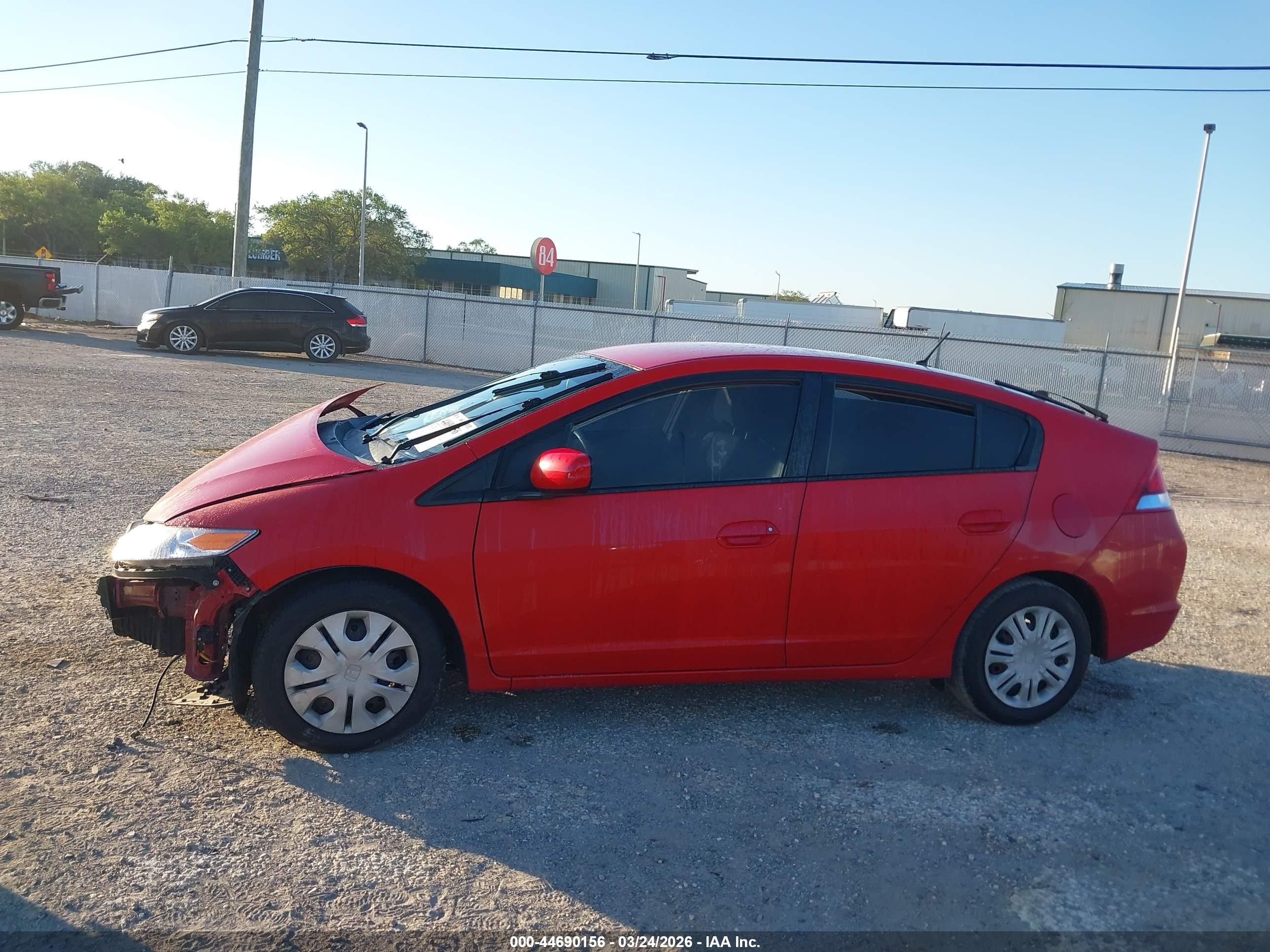2012 Honda Insight   Red vin: JHMZE2H33CS000620