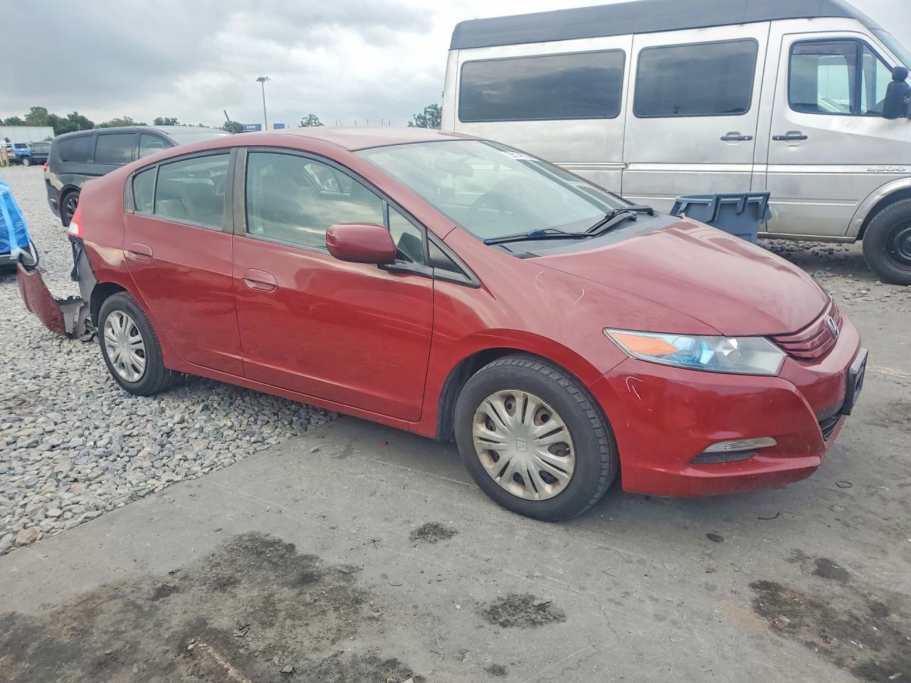 2011 Honda Insight Burgundy vin: JHMZE2H35BS003369