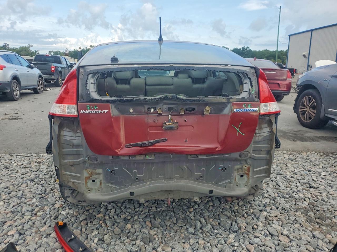 2011 Honda Insight Burgundy vin: JHMZE2H35BS003369