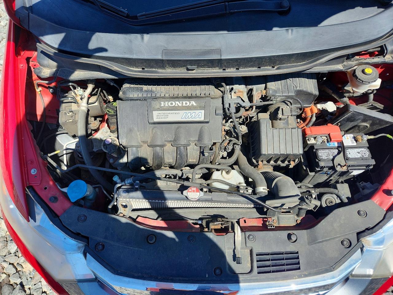 2012 Honda Insight Red vin: JHMZE2H39CS004316
