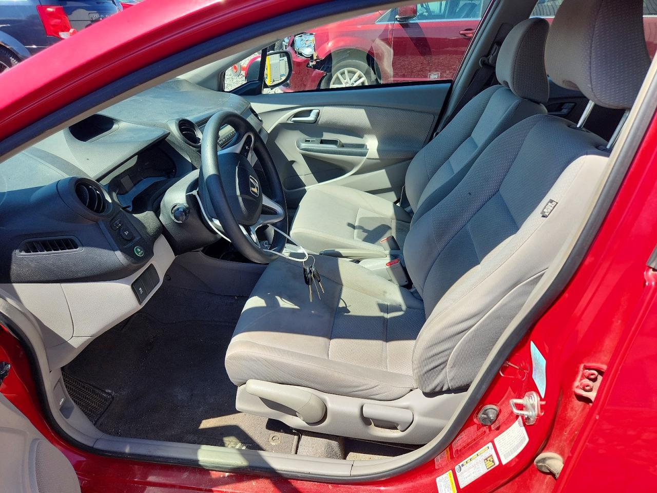 2012 Honda Insight Red vin: JHMZE2H39CS004316