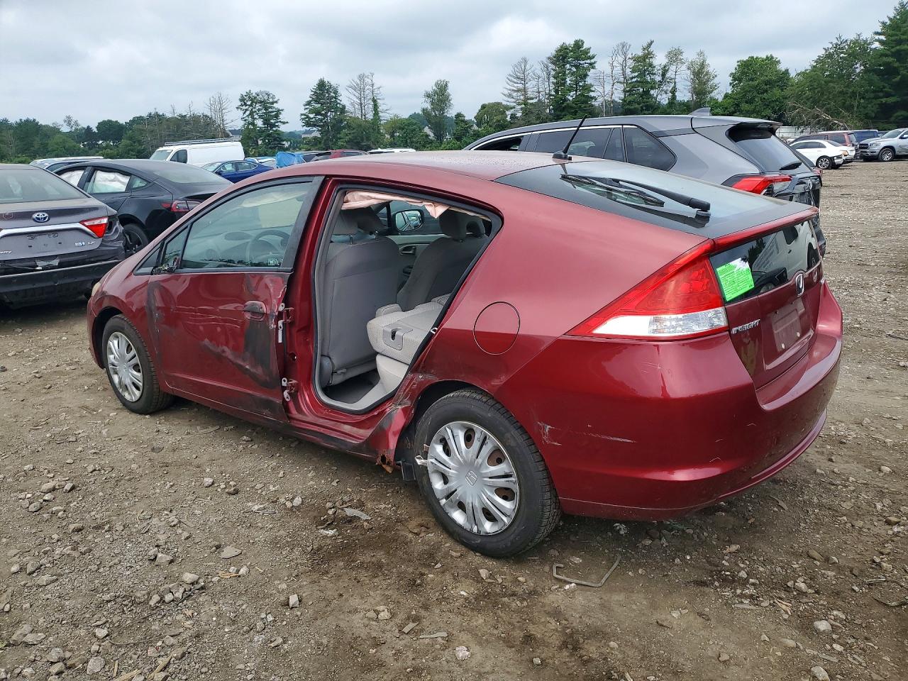 2010 Honda Insight Lx Red vin: JHMZE2H50AS004915