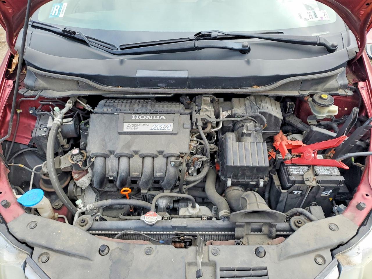 2010 Honda Insight Lx Red vin: JHMZE2H50AS004915