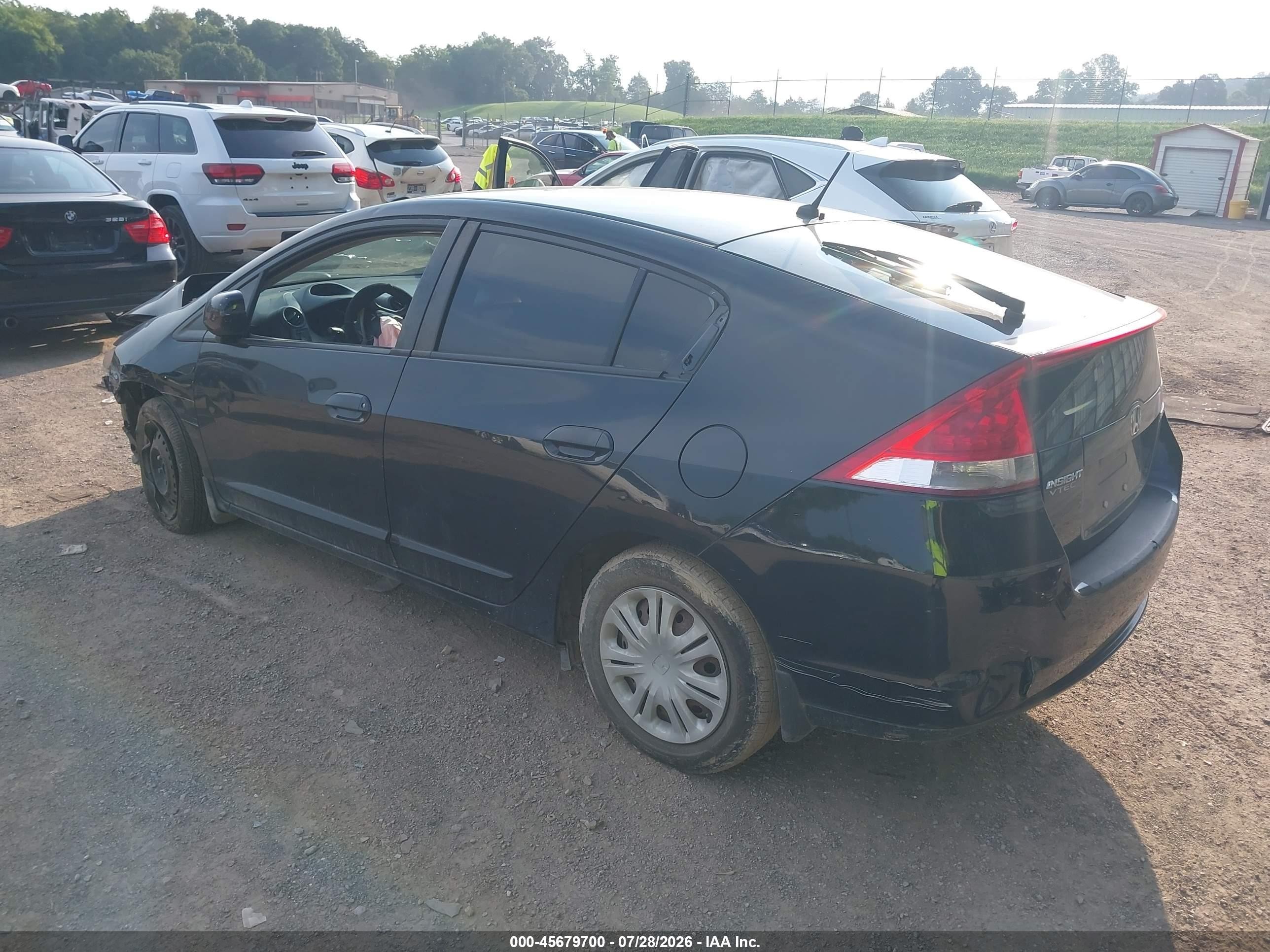 2010 Honda Insight Lx Black vin: JHMZE2H52AS021182