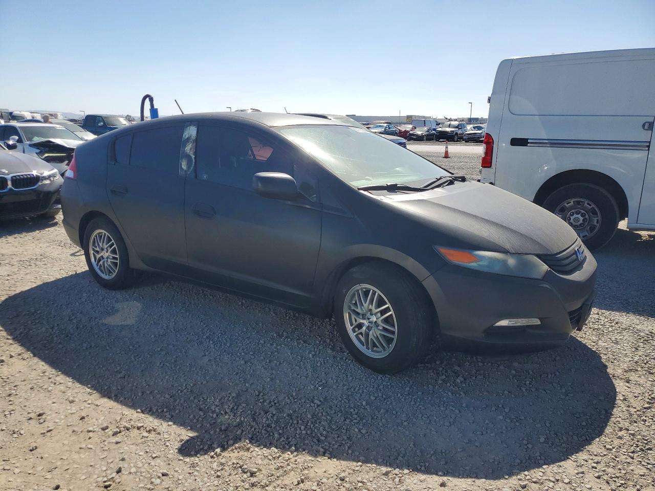 2010 Honda Insight Lx Black vin: JHMZE2H55AS014792