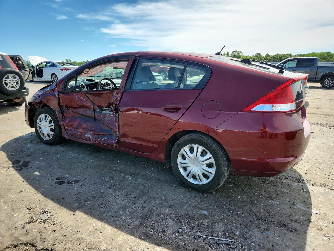 2010 Honda Insight Lx Red vin: JHMZE2H56AS033724