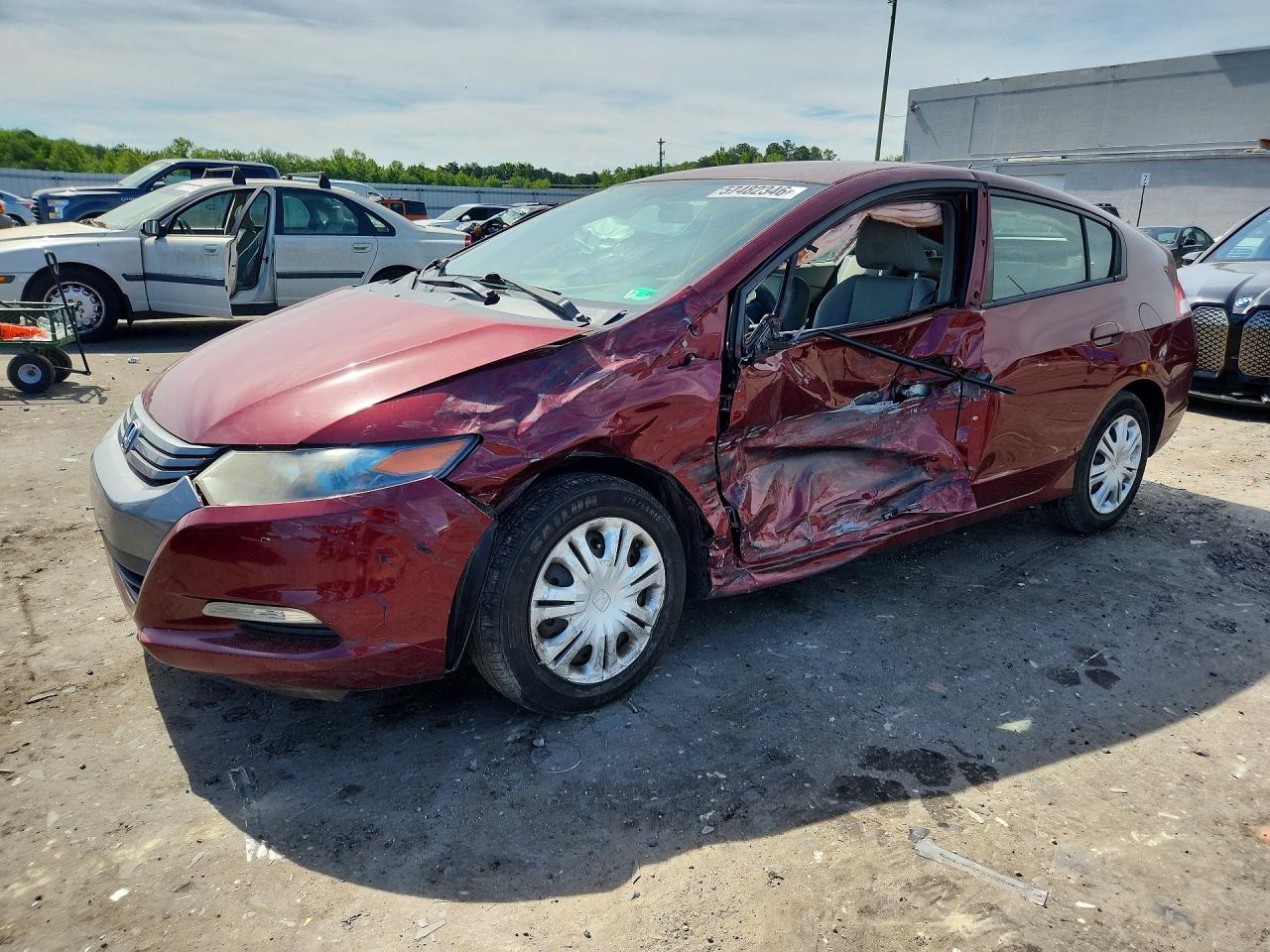 2010 Honda Insight Lx Red vin: JHMZE2H56AS033724