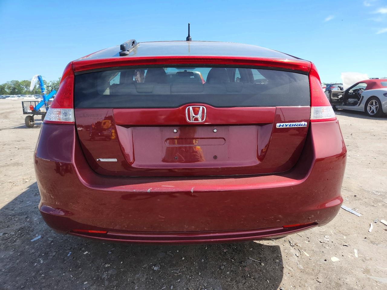 2010 Honda Insight Lx Red vin: JHMZE2H56AS033724