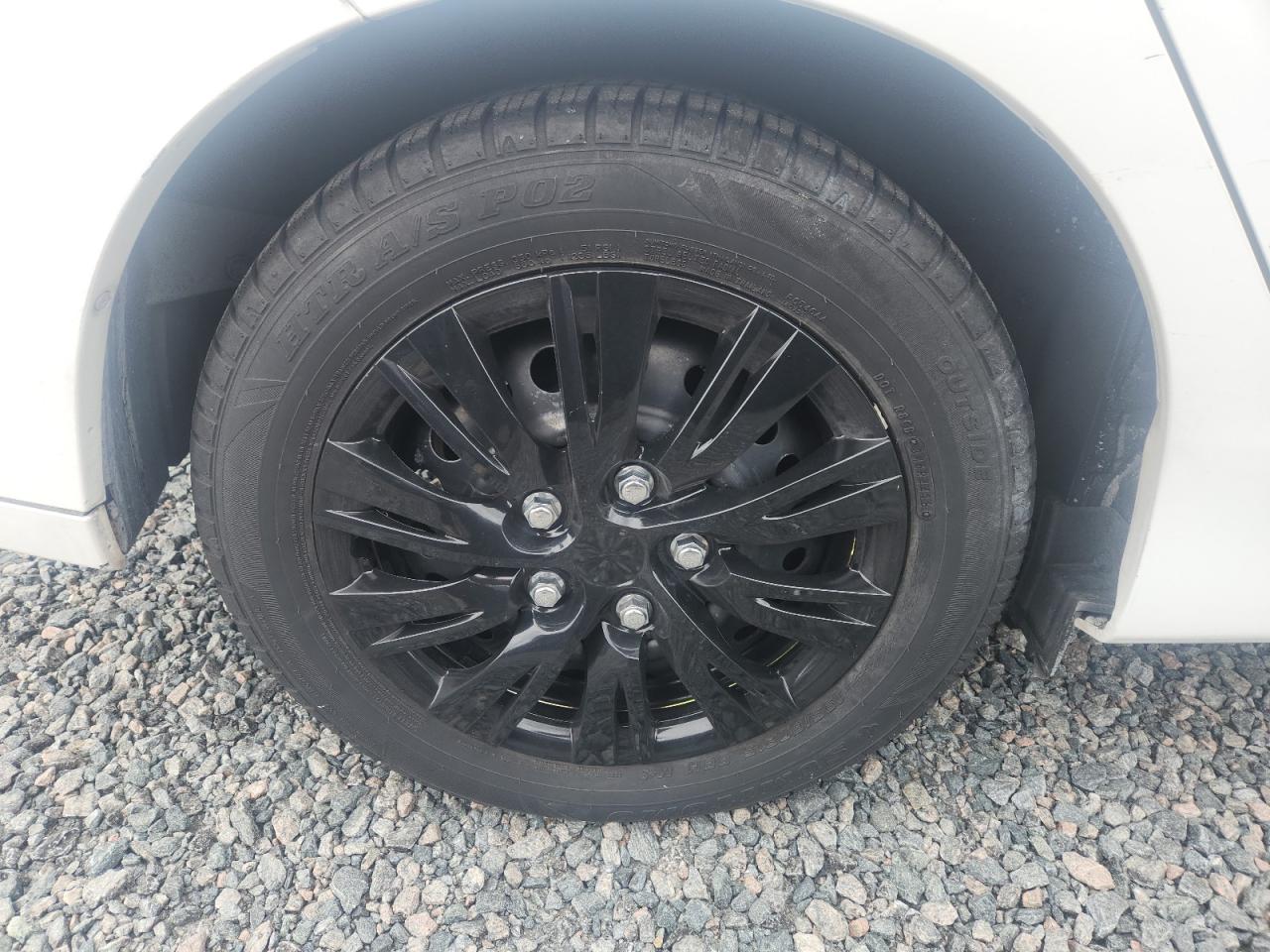 2014 Honda Insight Lx White vin: JHMZE2H56ES000101 Damage: Right Rear Wheel Cover, Curb Rash, 1/2 To 1 Inch