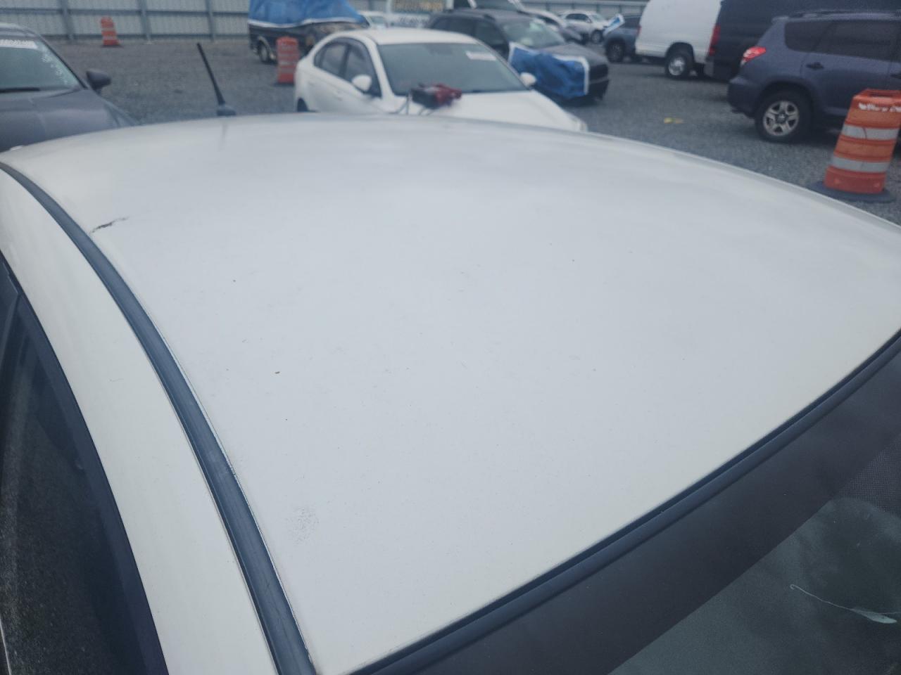 2014 Honda Insight Lx White vin: JHMZE2H56ES000101 Damage: Roof, Heavy Scratch, 1 To 2 Inches