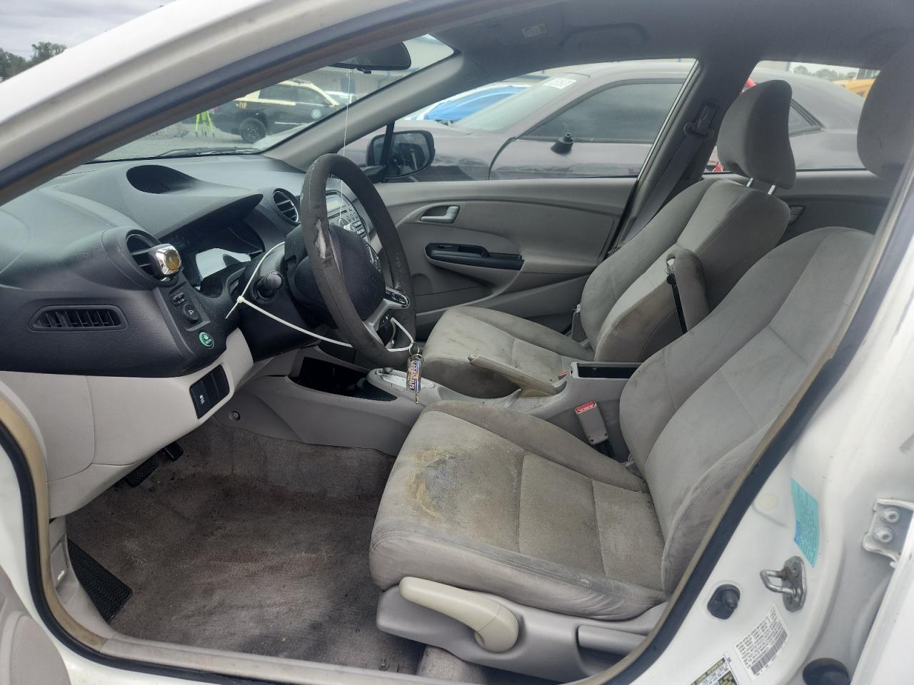 2014 Honda Insight Lx White vin: JHMZE2H56ES000101 Damage: Steering Wheel, Worn, Replacement Required