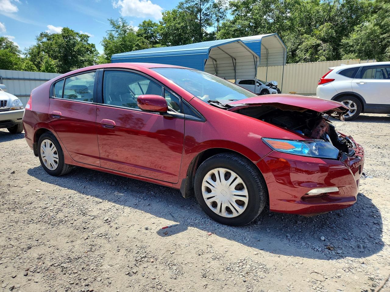 2010 Honda Insight Lx Red vin: JHMZE2H5XAS012293