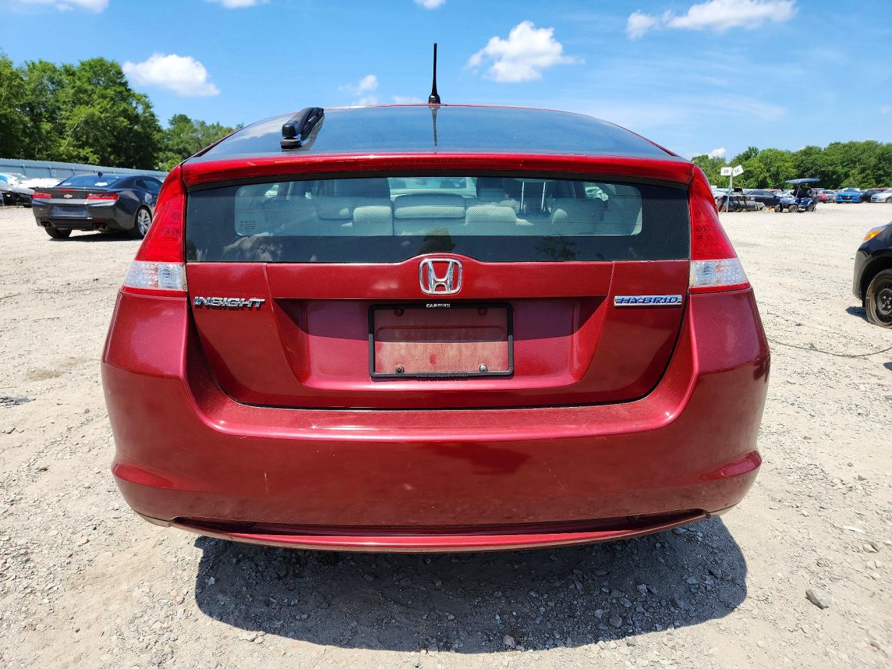 2010 Honda Insight Lx Red vin: JHMZE2H5XAS012293
