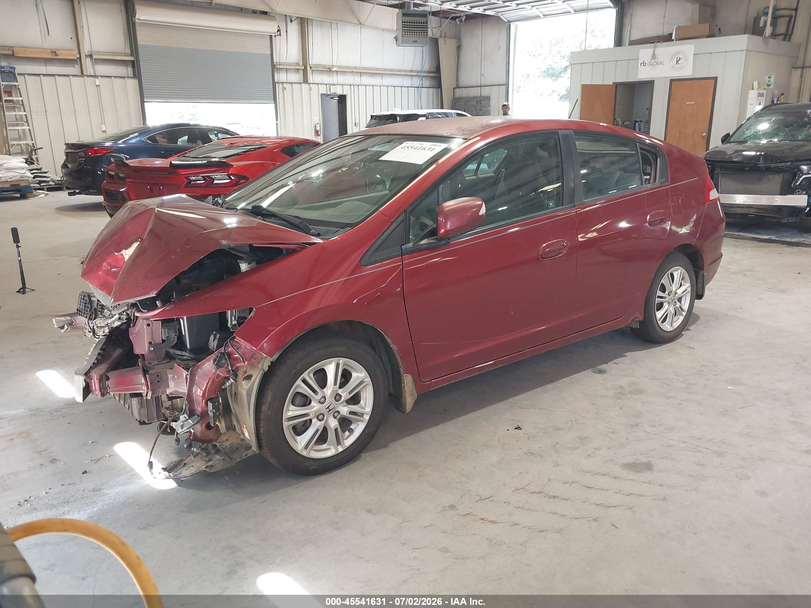 2010 Honda Insight Ex Red vin: JHMZE2H70AS034546