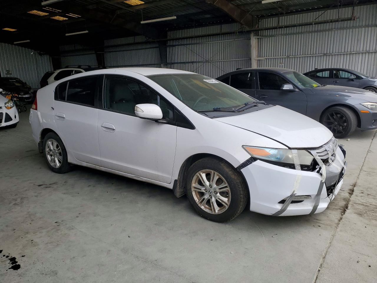 2010 Honda Insight White vin: JHMZE2H72AS007073