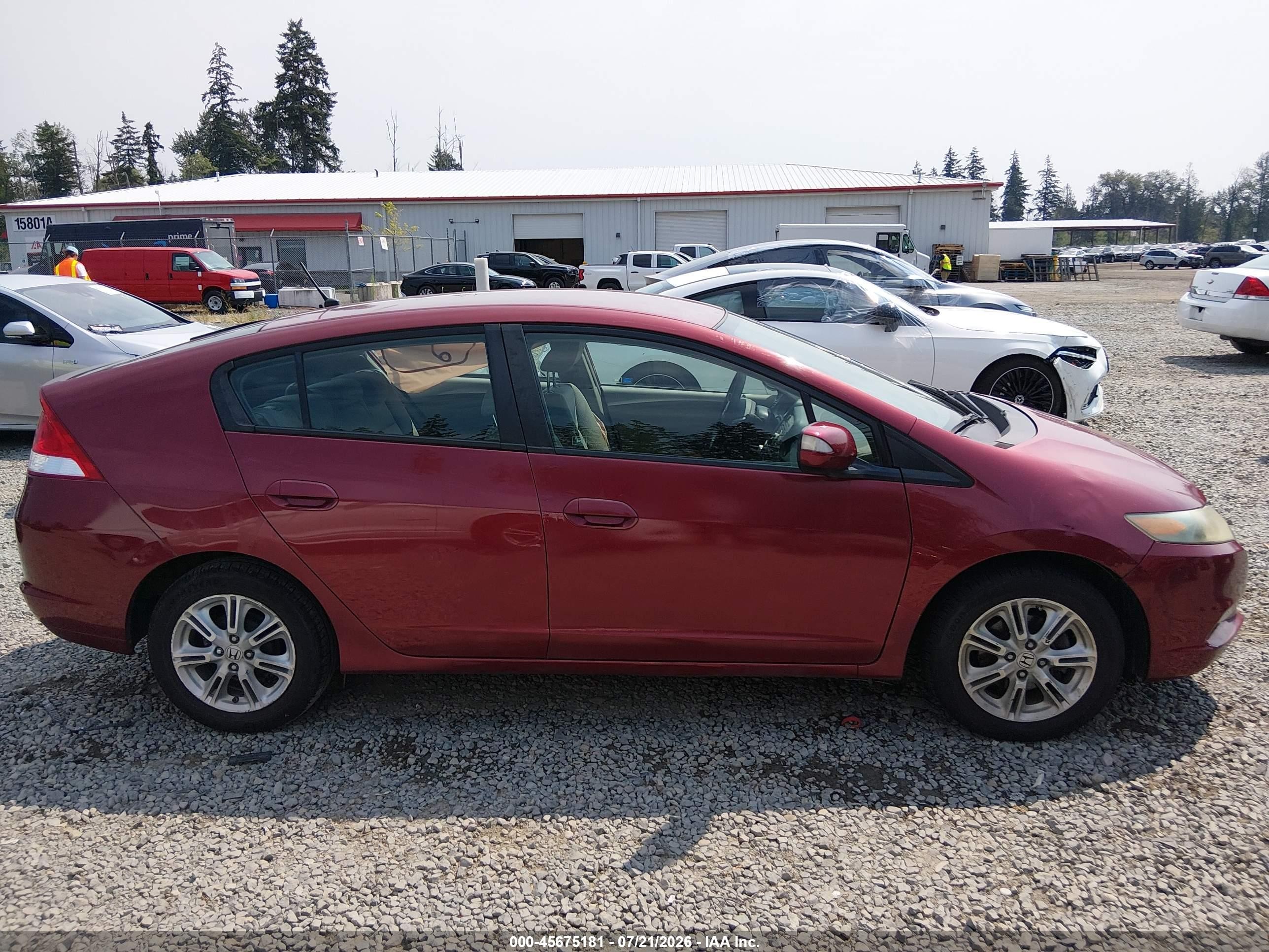 2010 Honda Insight Ex Red vin: JHMZE2H72AS024620