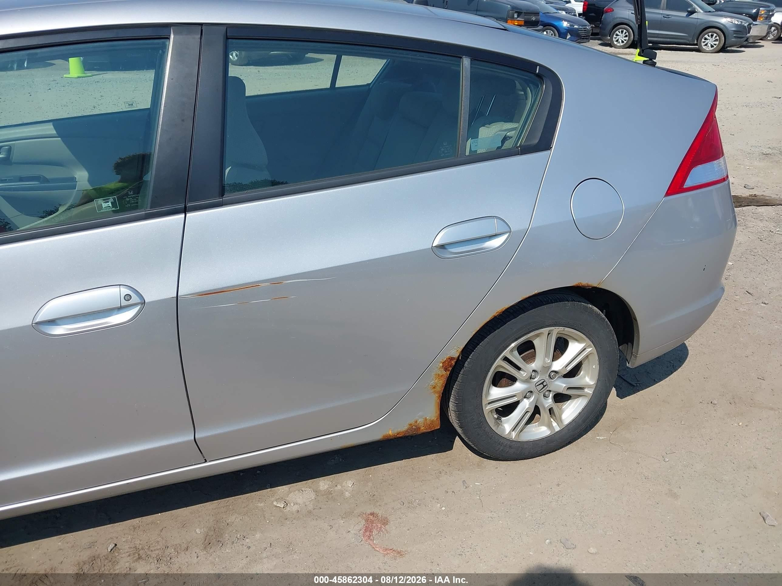 2010 Honda Insight Ex Silver vin: JHMZE2H74AS040530