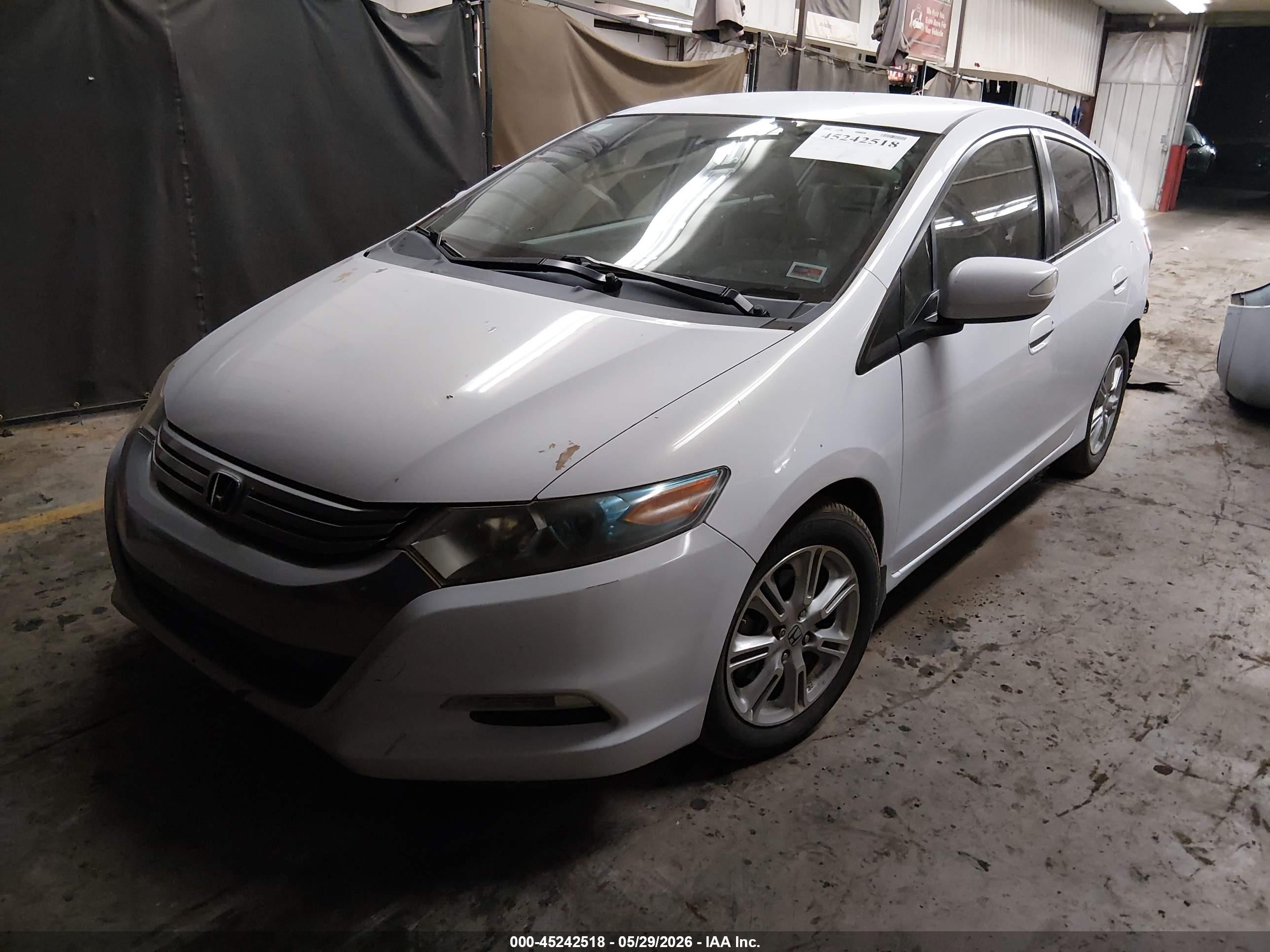 2010 Honda Insight Ex Light Blue vin: JHMZE2H74AS043332