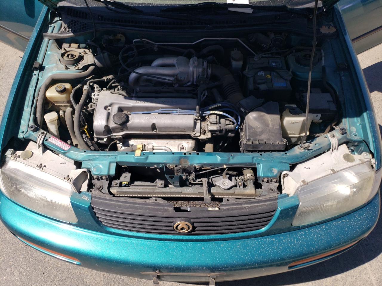 Price & History 1995 Mazda Protege Dx 1.5l 4 vin