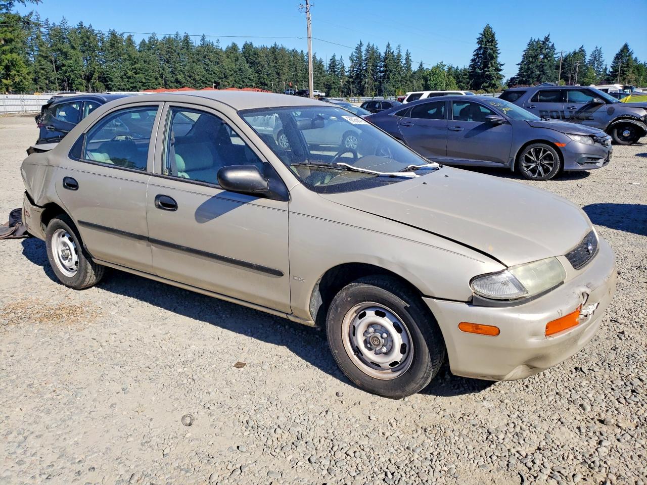1995 Mazda Protege Dx Tan vin: JM1BA1412S0110758
