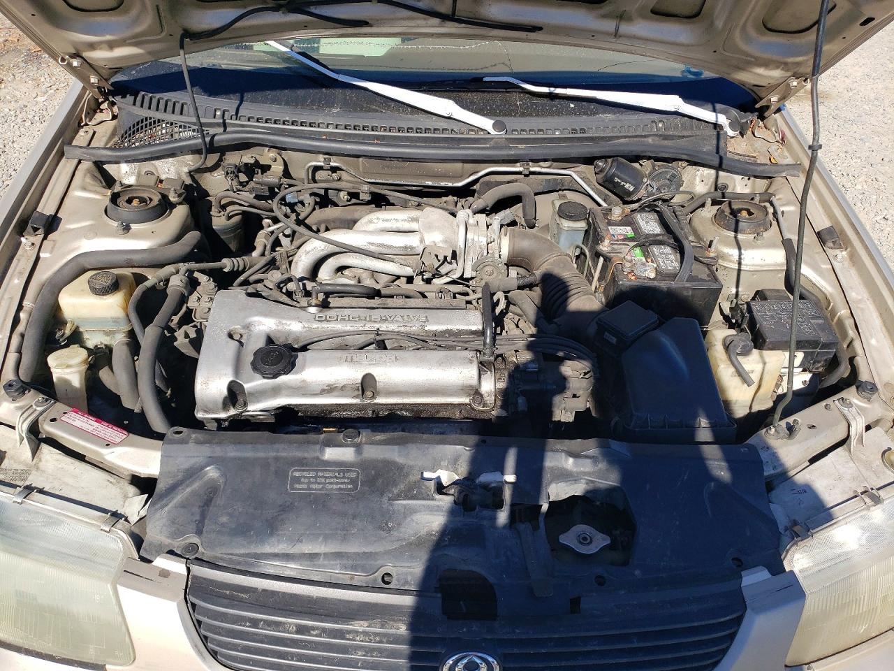 1995 Mazda Protege Dx Tan vin: JM1BA1412S0110758