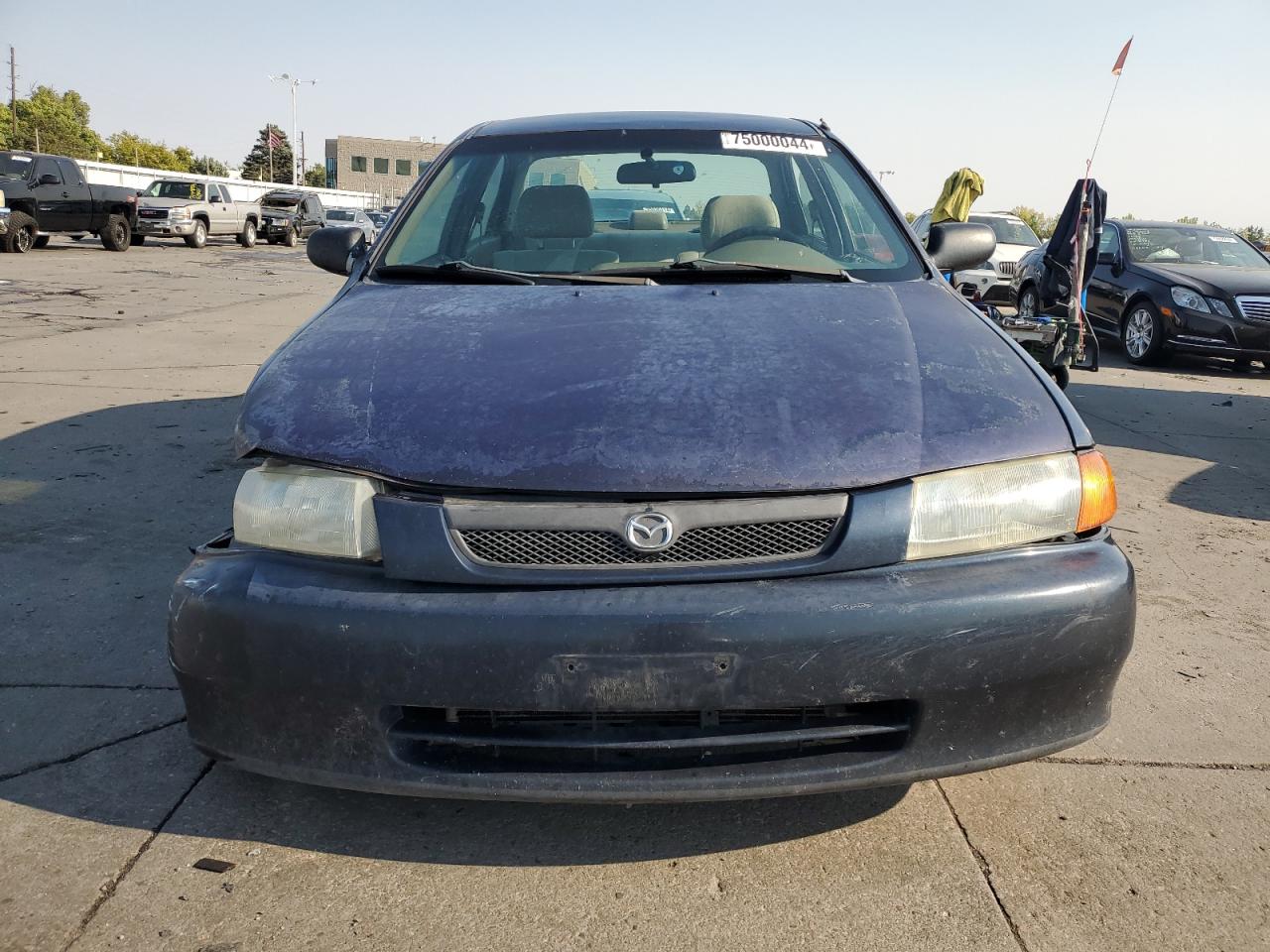 JM1BC1417W0215067 — 1998 MAZDA PROTEGE History & VIN | AutoHelperBot