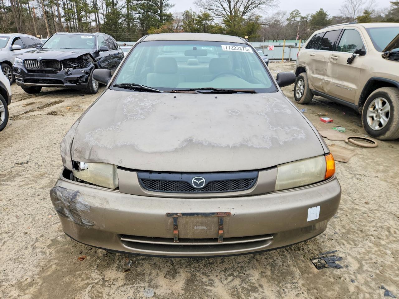 1998 Mazda Protege Dx Tan vin: JM1BC1418W0179387