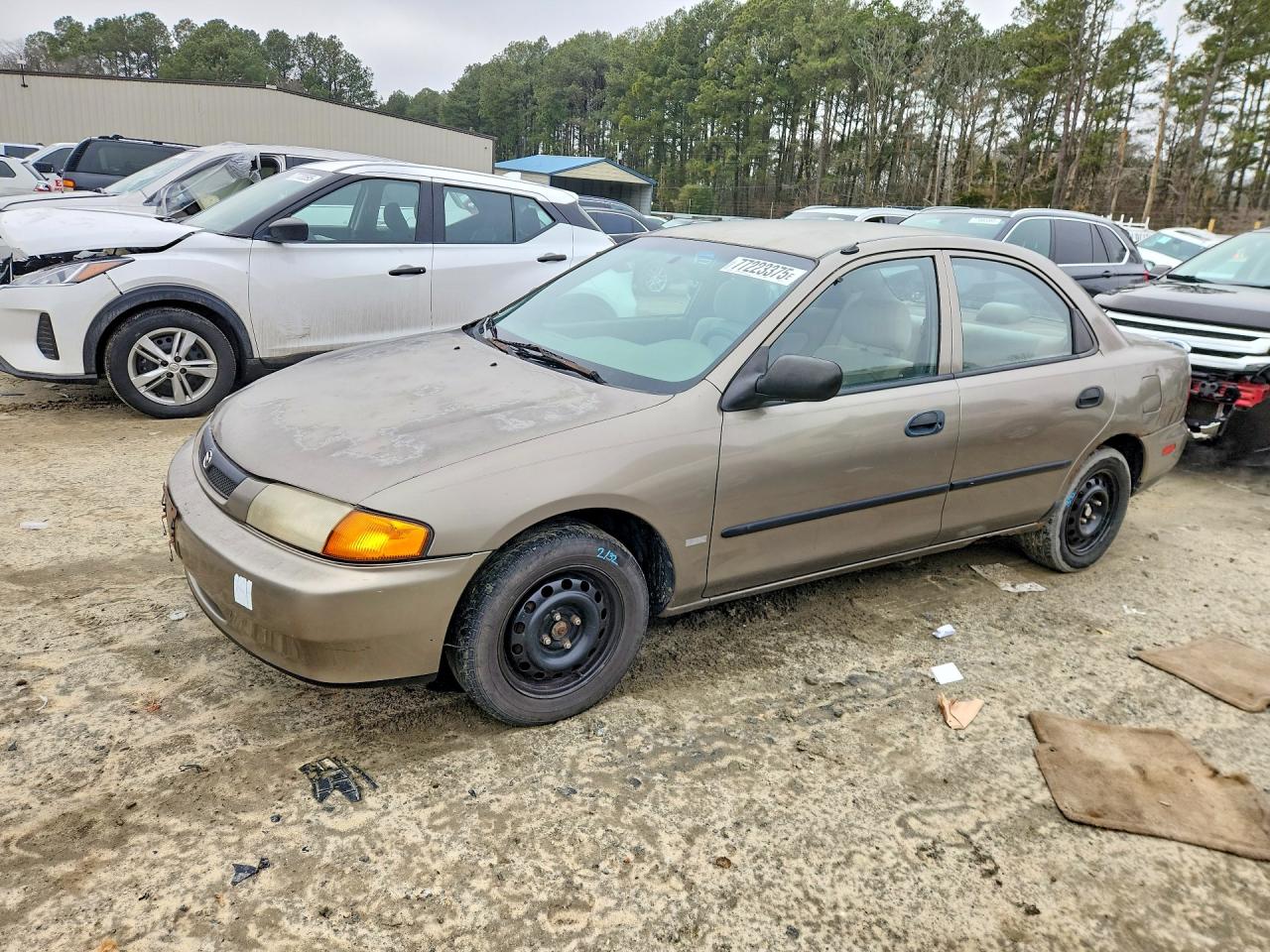1998 Mazda Protege Dx Tan vin: JM1BC1418W0179387