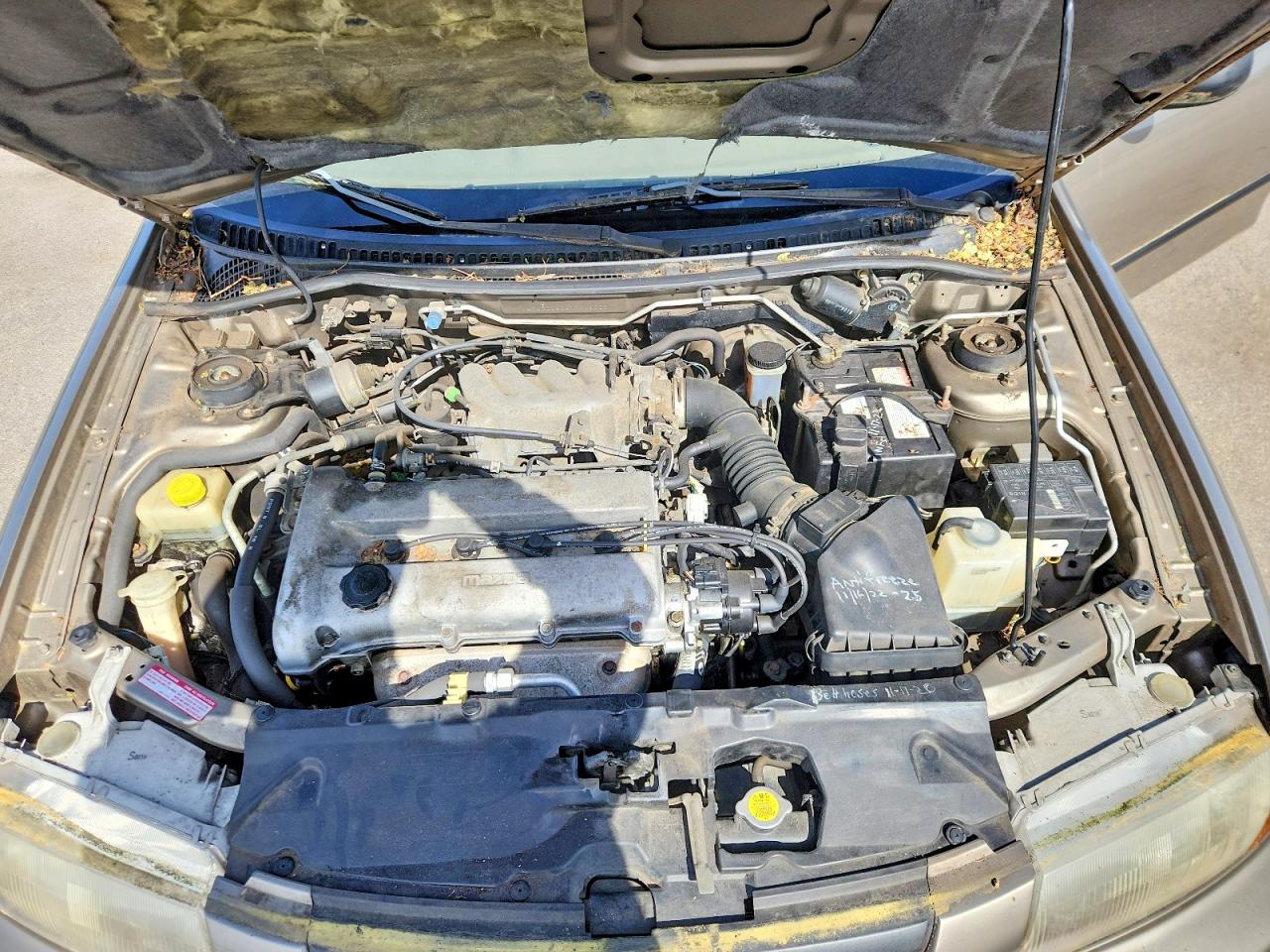 1998 Mazda Protege Lx Gold vin: JM1BC1424W0219229