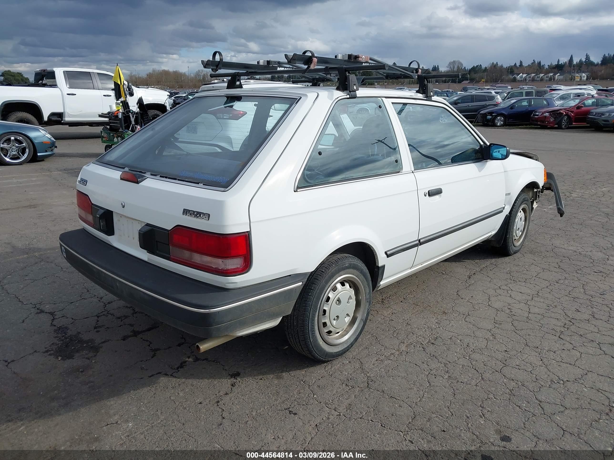 1989 Mazda 323   White vin: JM1BF2321K0343192