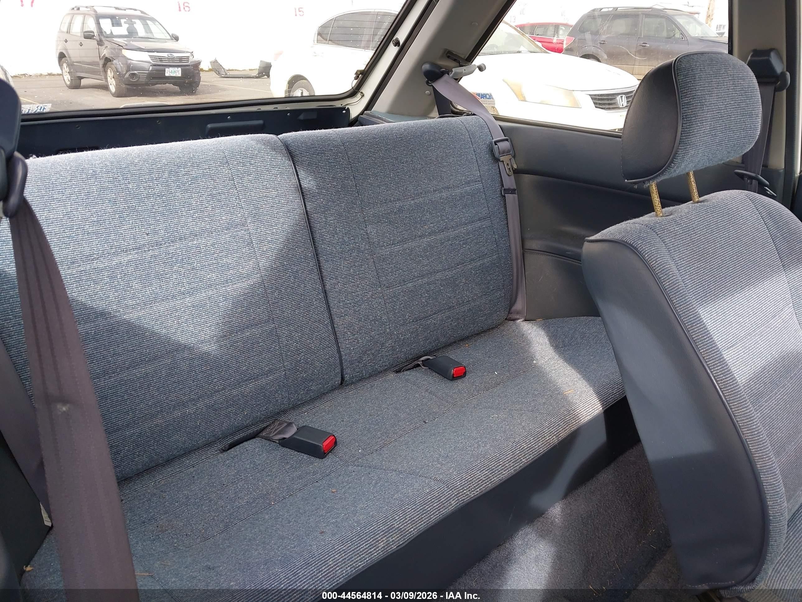 1989 Mazda 323   White vin: JM1BF2321K0343192