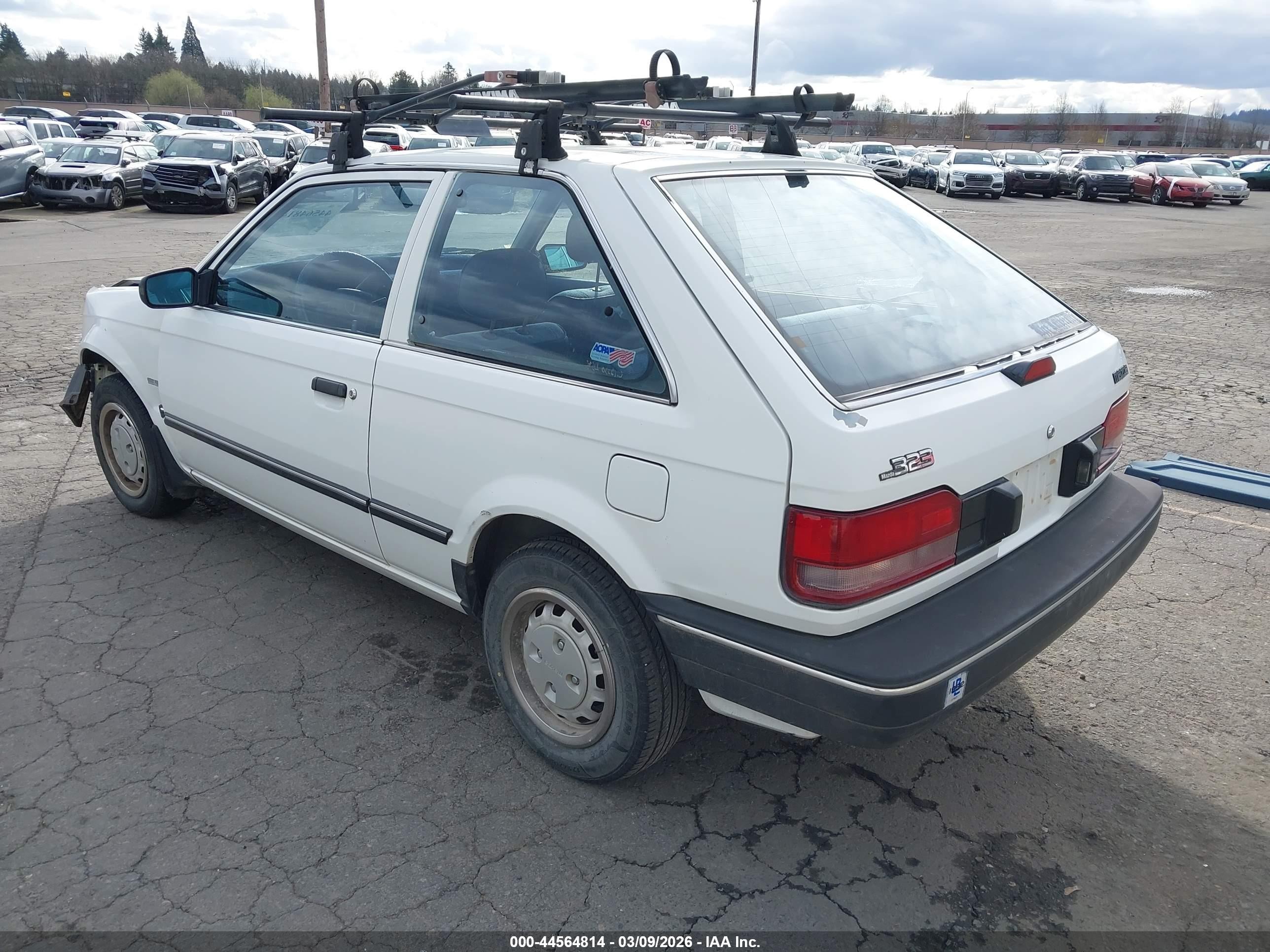 1989 Mazda 323   White vin: JM1BF2321K0343192