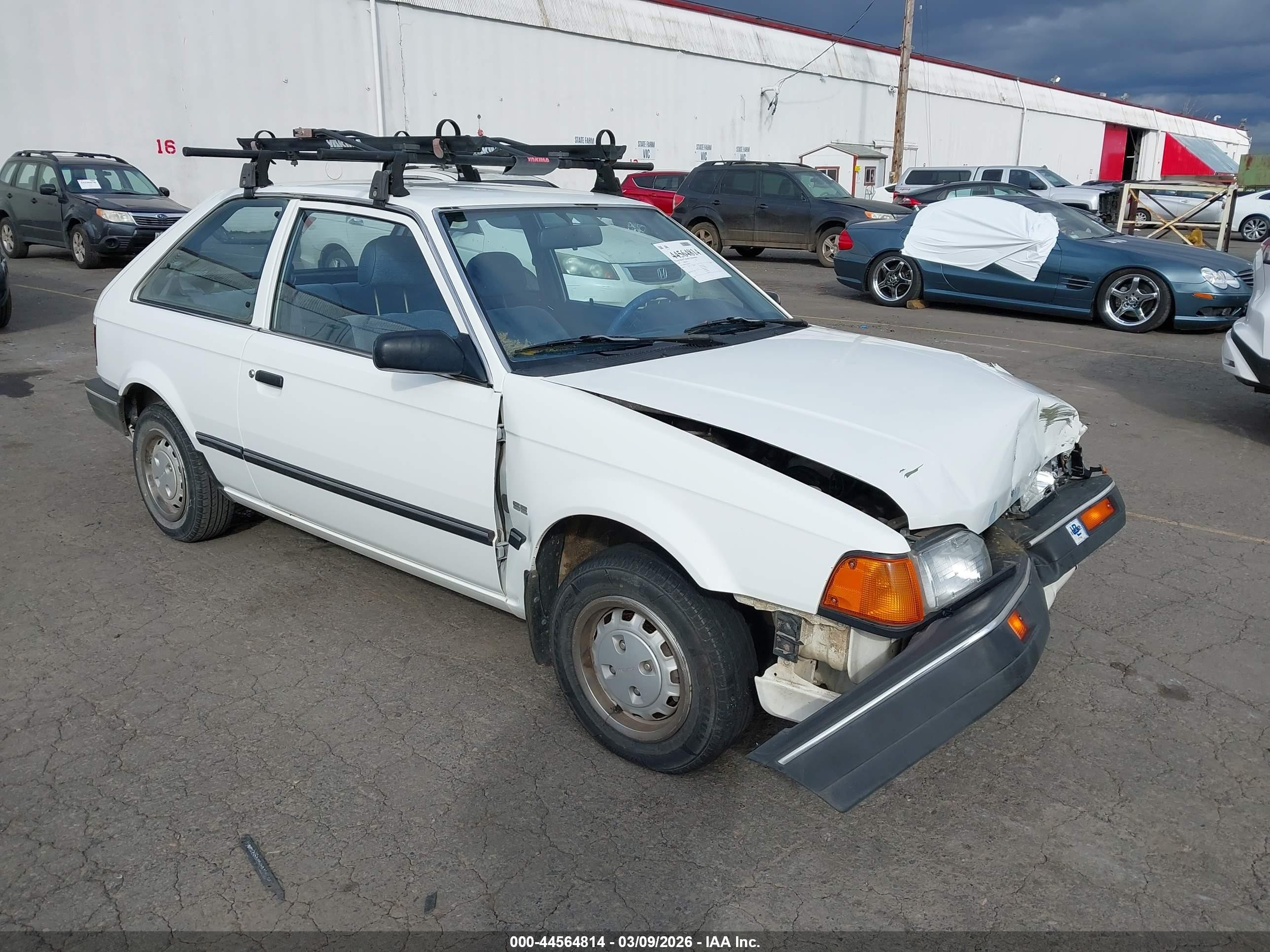 1989 Mazda 323   White vin: JM1BF2321K0343192