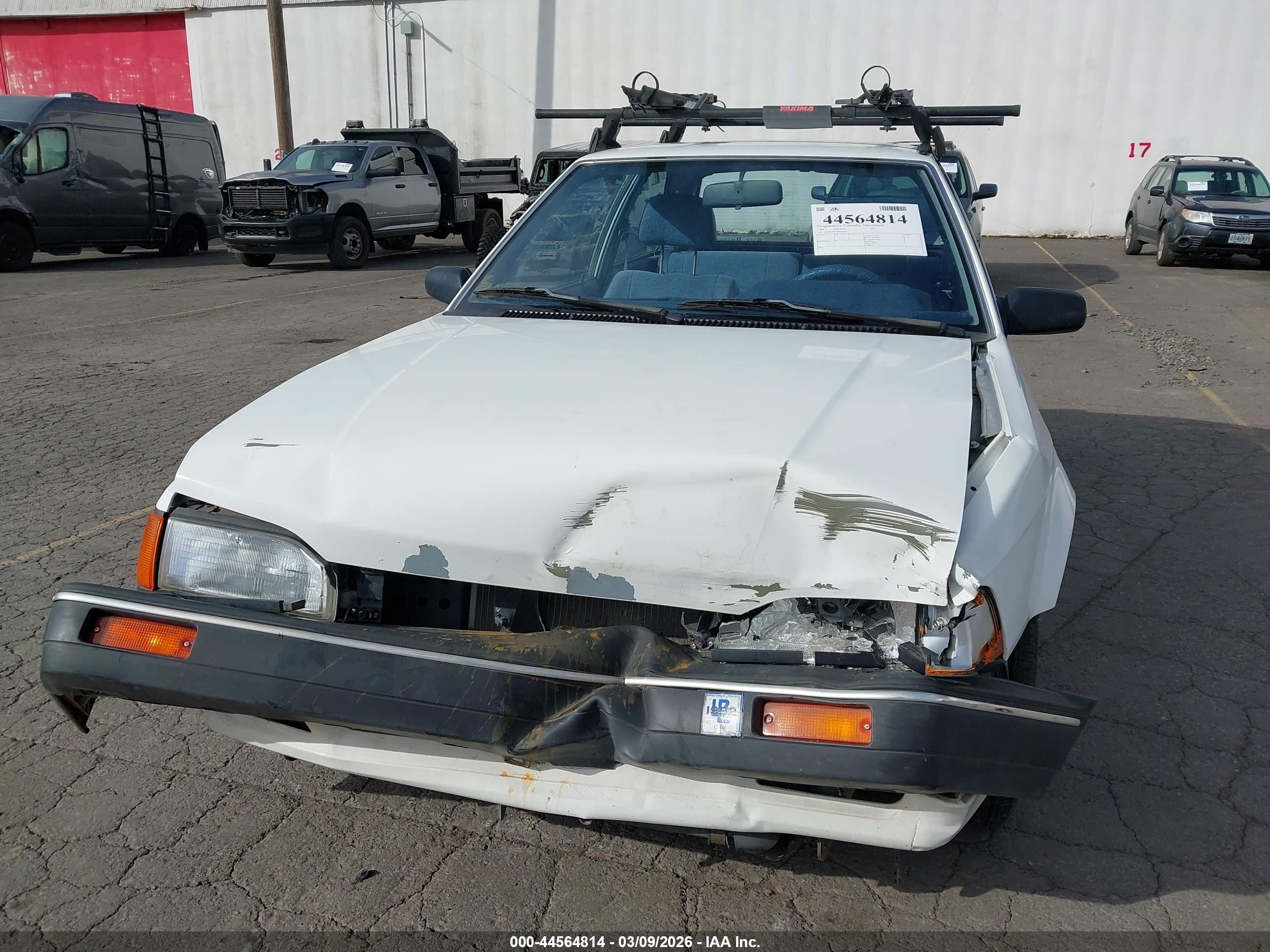 1989 Mazda 323   White vin: JM1BF2321K0343192