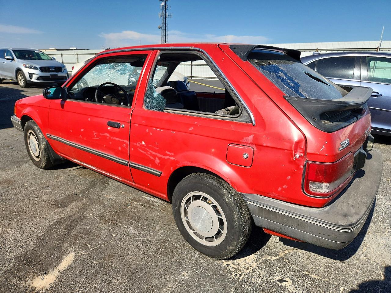 1989 Mazda 323 Red vin: JM1BF232XK0333826