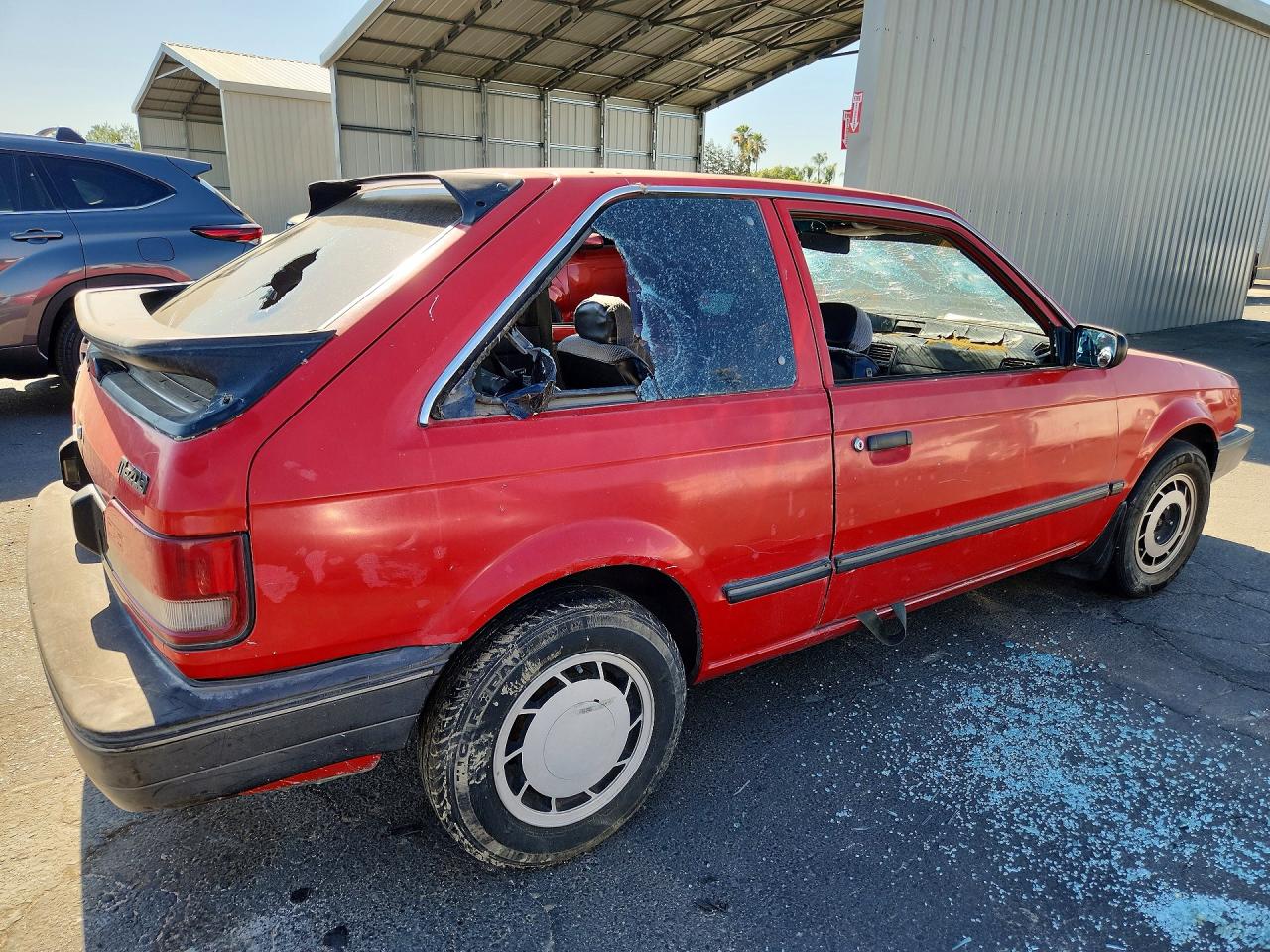 1989 Mazda 323 Red vin: JM1BF232XK0333826