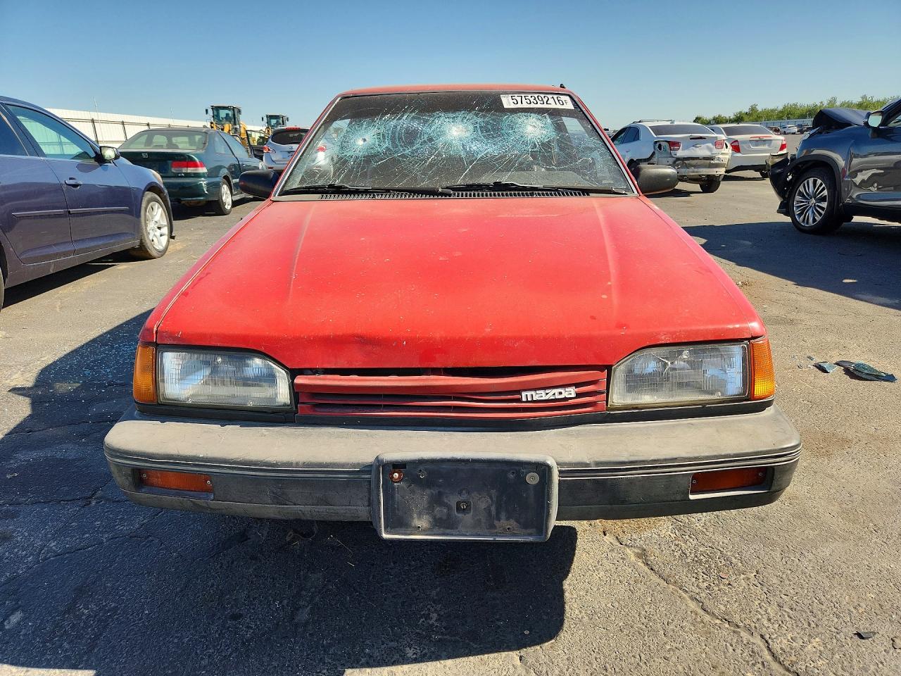 1989 Mazda 323 Red vin: JM1BF232XK0333826