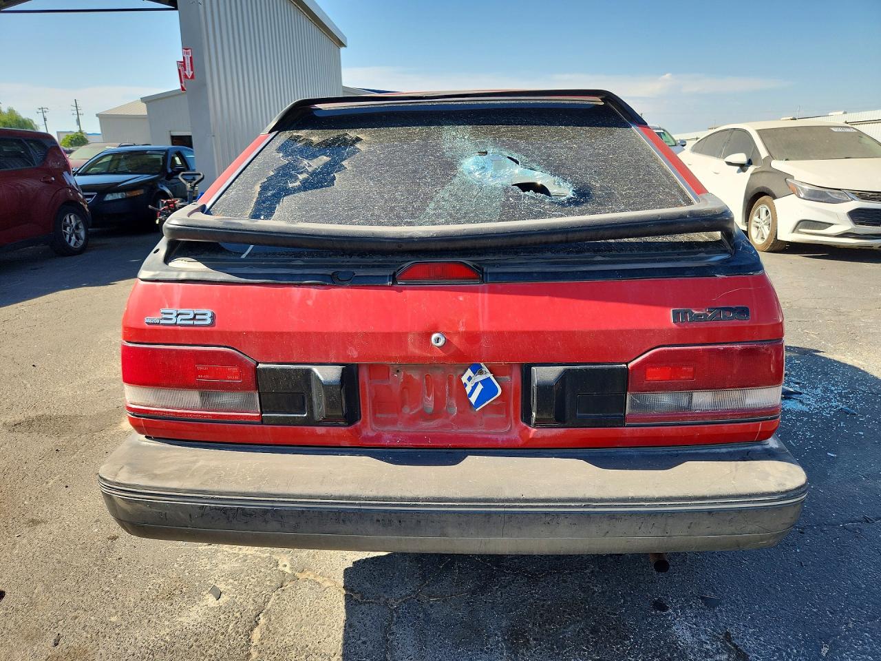 1989 Mazda 323 Red vin: JM1BF232XK0333826