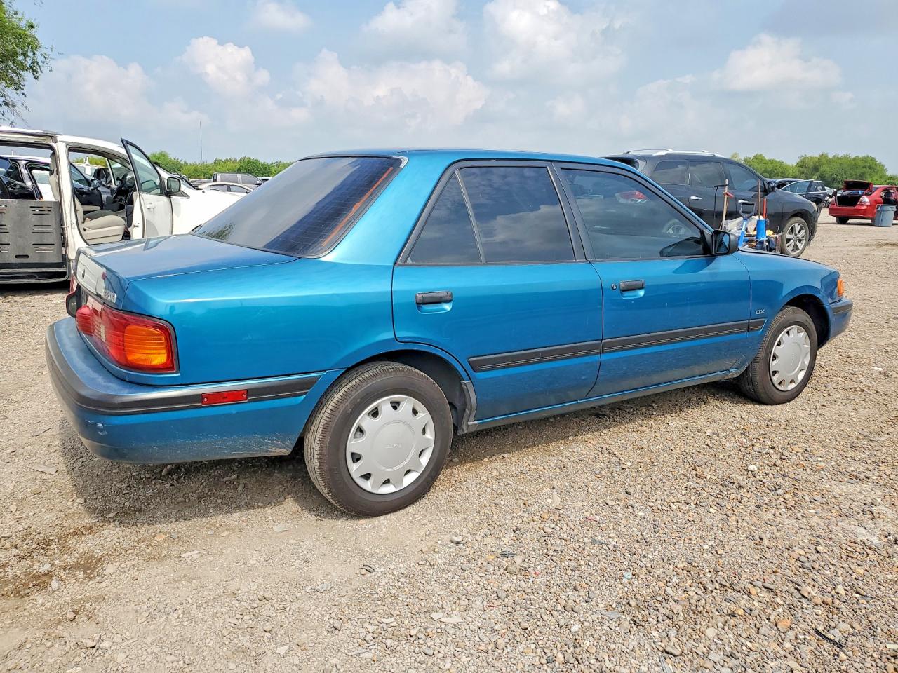 1994 Mazda Protege Dx Blue vin: JM1BG2247R0810805