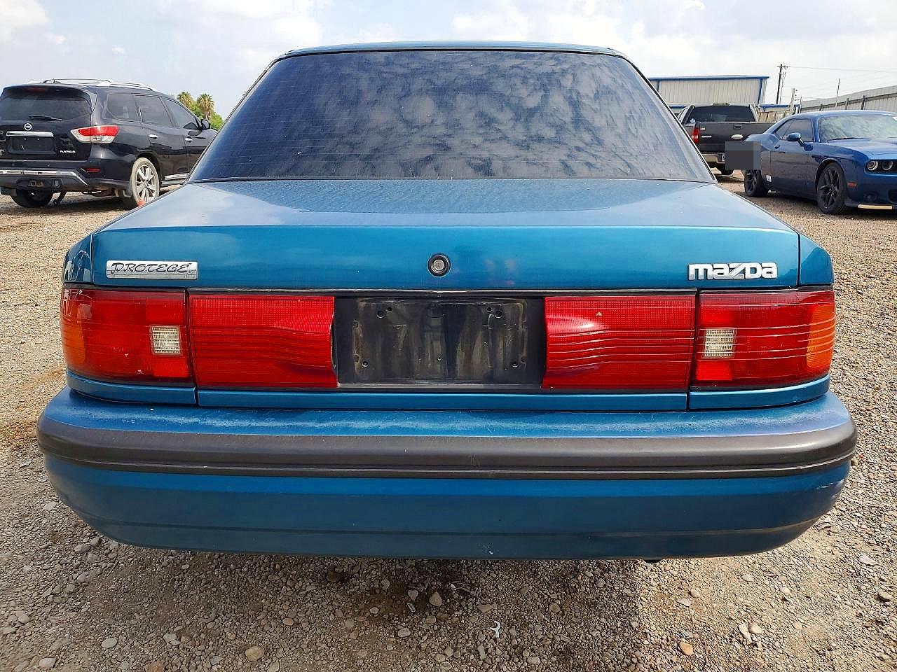 1994 Mazda Protege Dx Blue vin: JM1BG2247R0810805