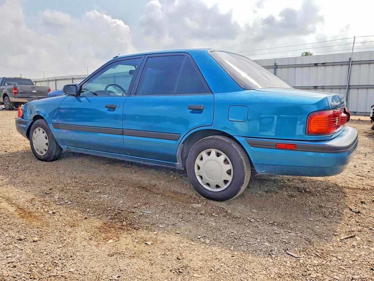 1994 Mazda Protege Dx Blue vin: JM1BG2247R0810805